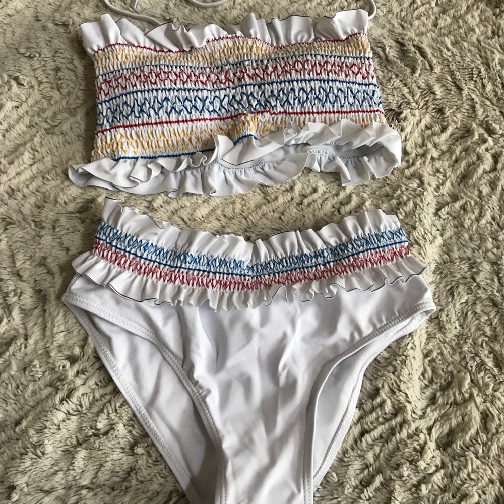 NWOT Boutique swim suit size small.
